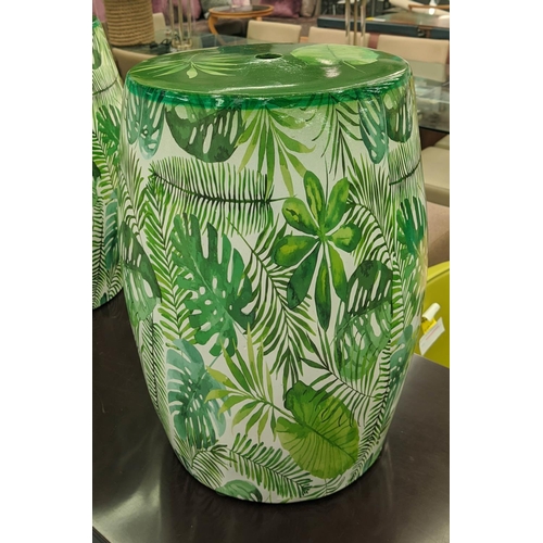 520 - BARREL STOOLS, a pair, tropical print glazed ceramic, 44cm H x 30cm diam. (2)