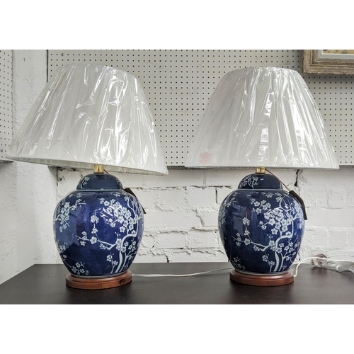 528 - LAUREN RALPH LAUREN TABLE LAMPS, a pair, 60cm H, Chinese style, blue and white ceramic, with shades.... 