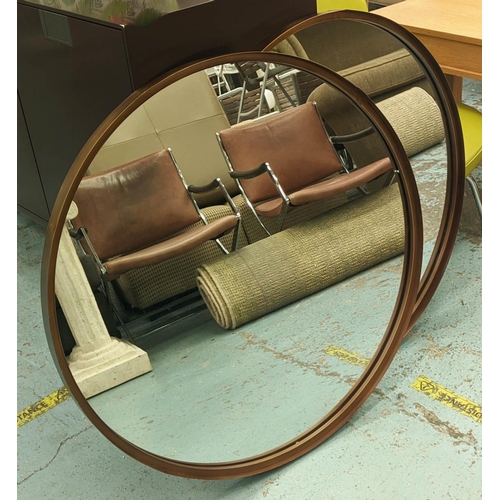 534 - CIRCULAR WALL MIRRORS, a pair, bronzed frames, 84cm diam each. (2)