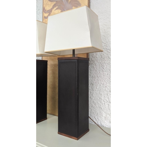 605 - LINLEY STYLE TABLE LAMPS, by Julian Chichester, a pair bases 50cm tall, brown stitched leather and w... 