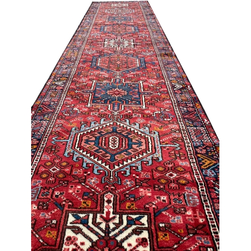 96 - PERSIAN KARAJA LONG RUNNER, 454cm x 100cm.