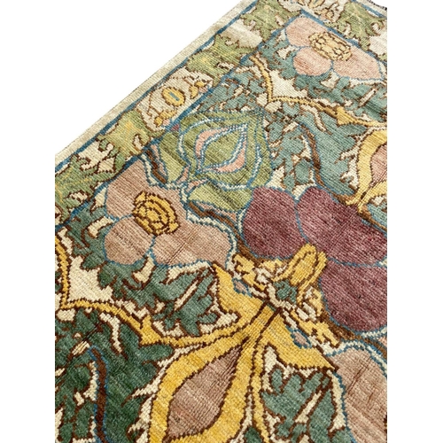 97 - C.F.A. VOYSEY DESIGN RUG, 224cm x 152cm, Arts and Crafts inspired.