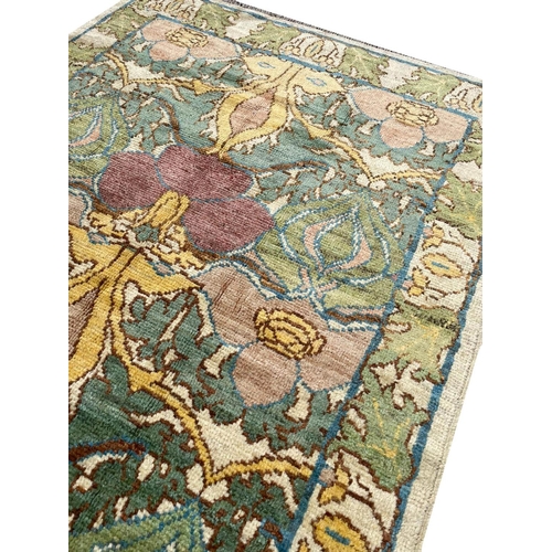 97 - C.F.A. VOYSEY DESIGN RUG, 224cm x 152cm, Arts and Crafts inspired.