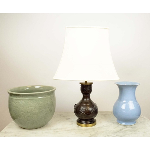 12 - CELEDON JARDINIERE, a powder blue Hu vase and a Japanese Meiji style bronzed lamp with shade. (3)