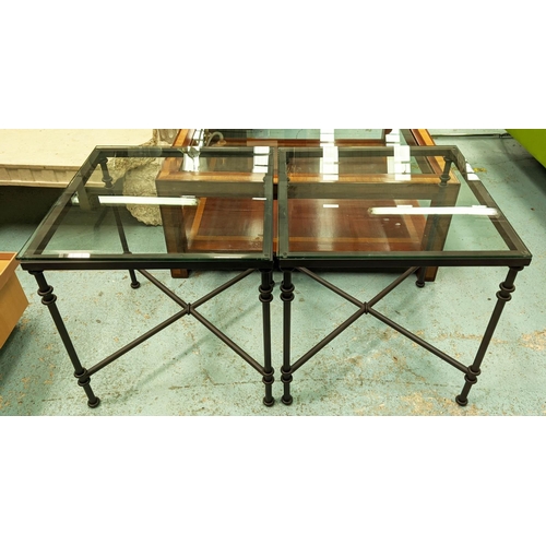 556 - OKA SIDE TABLES, 60cm W x 60cm D x 62cm H, a pair, glass and metal.