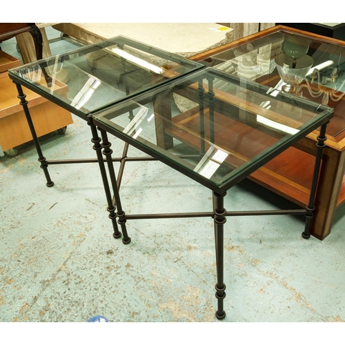 556 - OKA SIDE TABLES, 60cm W x 60cm D x 62cm H, a pair, glass and metal.