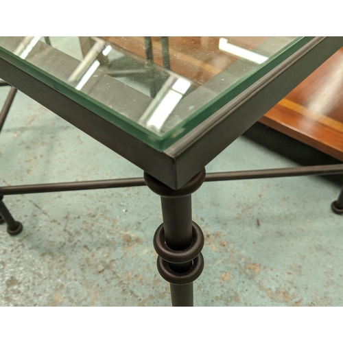 556 - OKA SIDE TABLES, 60cm W x 60cm D x 62cm H, a pair, glass and metal.