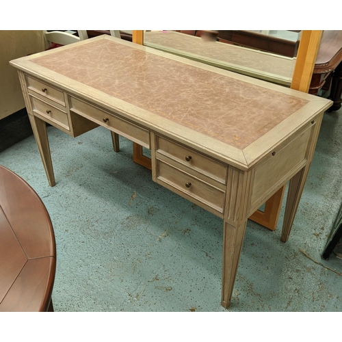 558 - DESK, 135cm W x 60cm D x 76cm H, limed oak with inlaid leather writing surface.