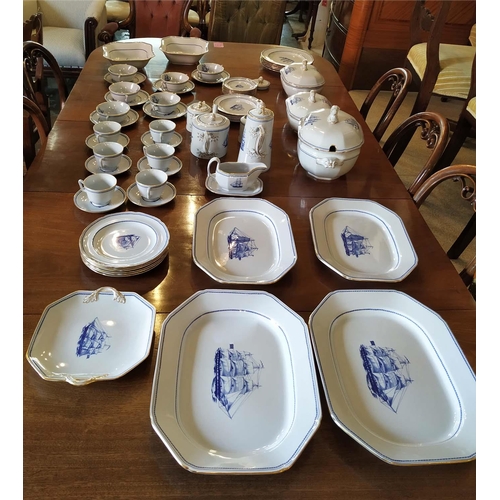 8 - DINNER SERVICE, Spode, blue and white with gilt rims, 'Trade Winds' pattern, six place setting inclu... 