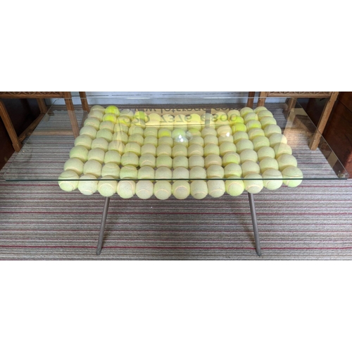 535 - STOOL/LOW TABLE, tennis ball design, loose glass top, 110cm x 55cm x 52cm approx.