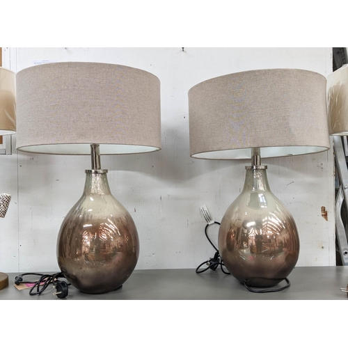 547 - GLASS DEMIJOHN SILVERED TABLE LAMPS, a pair, each 71cm tall overall including shades. (2)