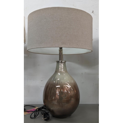 547 - GLASS DEMIJOHN SILVERED TABLE LAMPS, a pair, each 71cm tall overall including shades. (2)