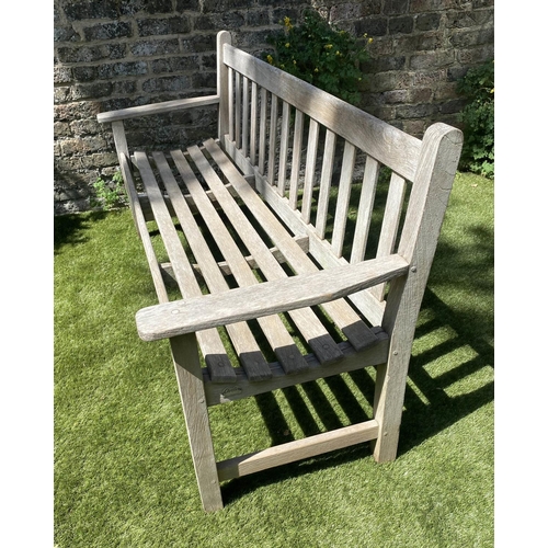 342 - GLOSTER GARDEN BENCH, silvery weathered teak of slatted form with flat top arms, 159cm W.