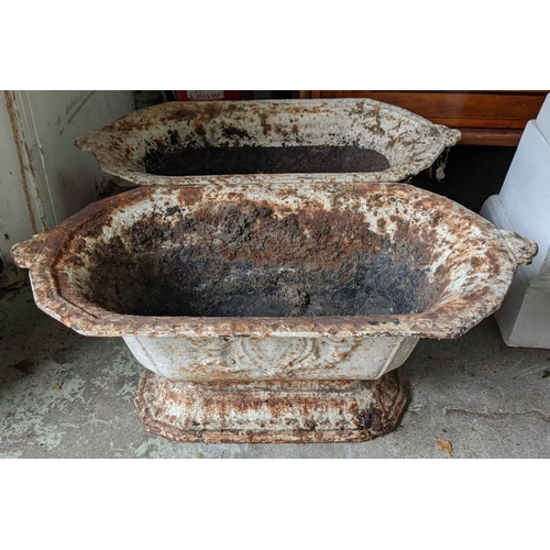 318 - JARDINIERES, 23cm H x 63cm H x 34cm D, a set of three, 19th century cast iron in distressed white pa... 