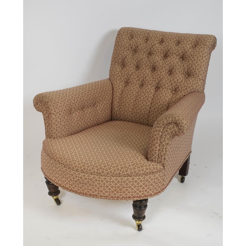 329 - ARMCHAIR, 82cm H x 89cm W, late Victorian in Howard style and patterned material on later castors.