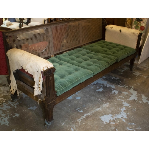 344 - SOFA, 91cm H, 218cm W x 77cm D, Regency rosewood, circa 1820, with caned back, seat, green plush sea... 