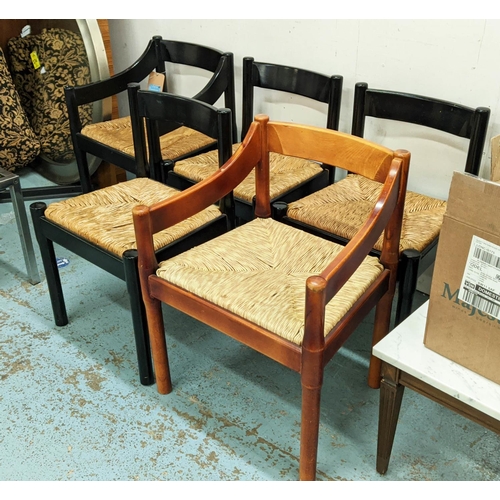 387 - AFTER VIGO MAGISTRETTI CARIMATE STYLE CHAIRS, a set of four in an ebonised finish, and one in a stai... 