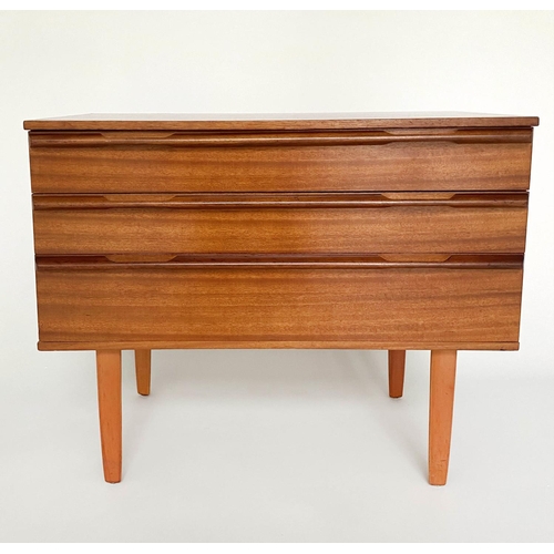 373 - CHEST, 1960's Afromosia teak, with three long drawers, integral handles and shaped tapering supports... 