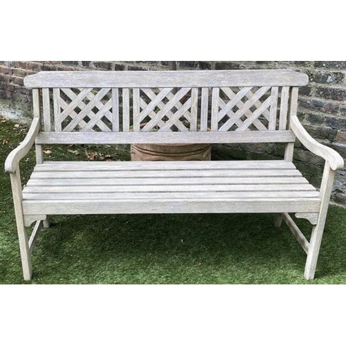 380 - LATTICE GARDEN BENCH, well weathered teak with triple lattice panelled back and slatted seat, 146cm ... 