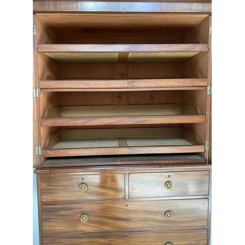 347 - LINEN PRESS, Regency figured mahogany with two panelled doors enclosing original trays above four dr... 