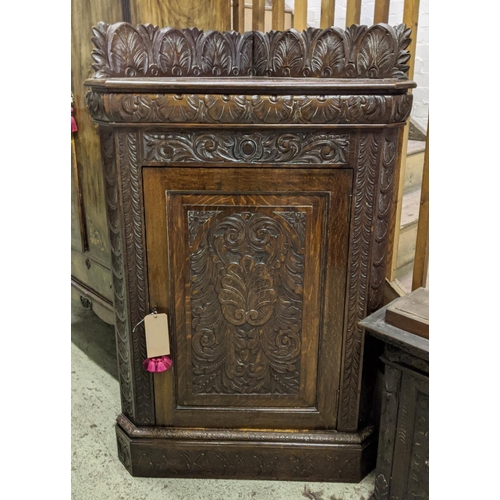 319 - FLOOR STANDING CORNER CUPBOARD, 91cm W x 144cm H x 51cm D late Victorian oak carved with a panelled ... 