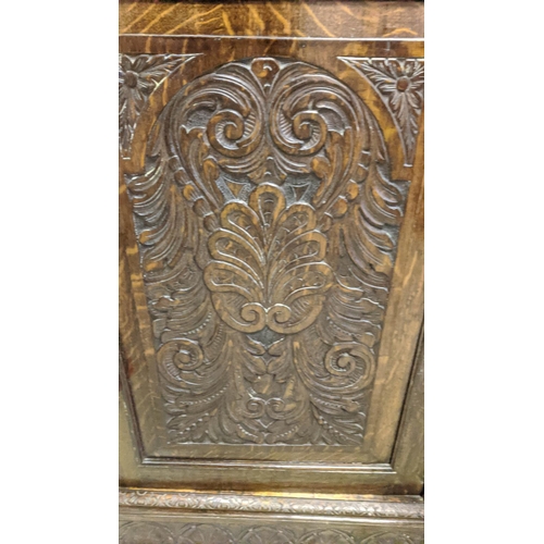 319 - FLOOR STANDING CORNER CUPBOARD, 91cm W x 144cm H x 51cm D late Victorian oak carved with a panelled ... 