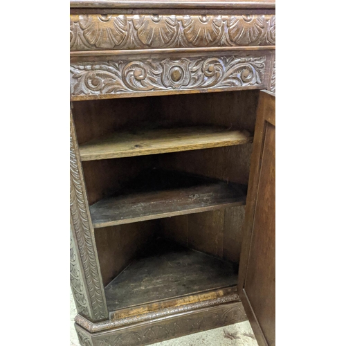 319 - FLOOR STANDING CORNER CUPBOARD, 91cm W x 144cm H x 51cm D late Victorian oak carved with a panelled ... 