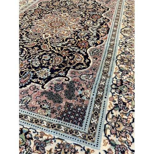 109 - ISPHAHAN DESIGN RUG, 180cm x 126cm.