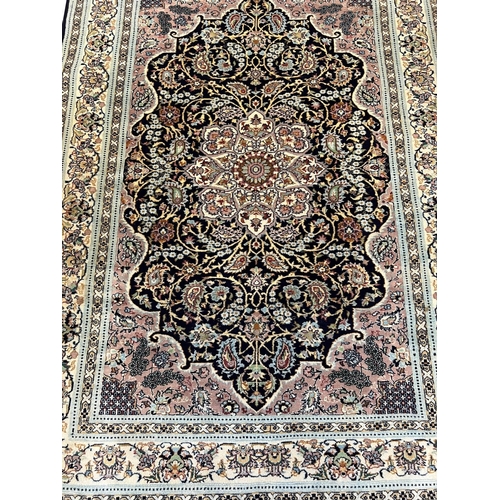 109 - ISPHAHAN DESIGN RUG, 180cm x 126cm.