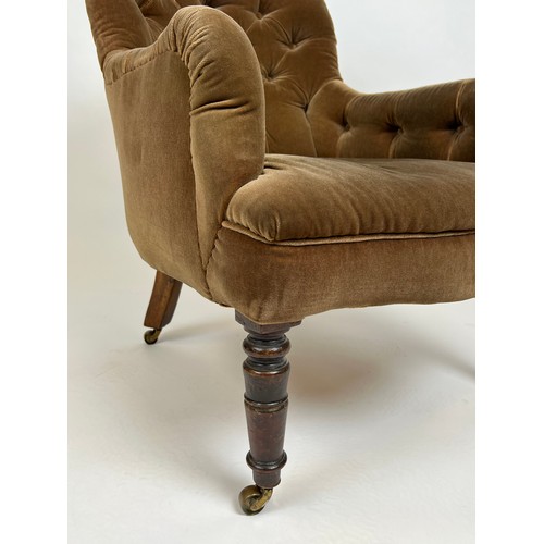 161 - VICTORIAN ARMCHAIR, dark olive velvet button back upholstered with turned front legs and castors, 87... 