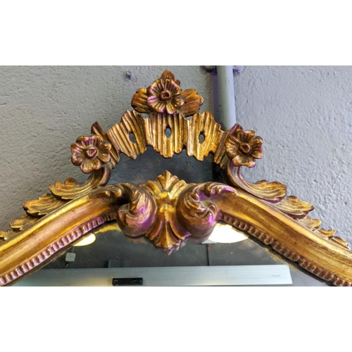 261 - WALL MIRROR, with a shaped gilt frame, 97cm x 89cm H.