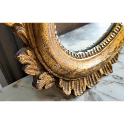 261 - WALL MIRROR, with a shaped gilt frame, 97cm x 89cm H.