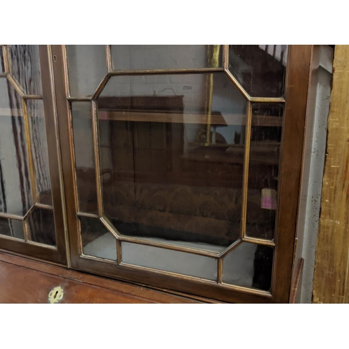 274 - BUREAU BOOKCASE, George III mahogany with two glazed doors enclosing shelves above a fall front, gre... 