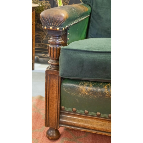 259 - SOFA, circa 1920, oak in old green/brown leather with newly upholstered velvet seat and back cushion... 