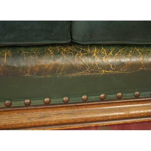 259 - SOFA, circa 1920, oak in old green/brown leather with newly upholstered velvet seat and back cushion... 