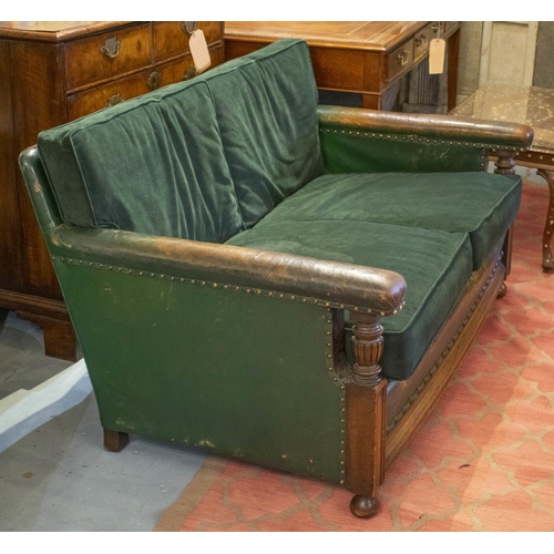 259 - SOFA, circa 1920, oak in old green/brown leather with newly upholstered velvet seat and back cushion... 