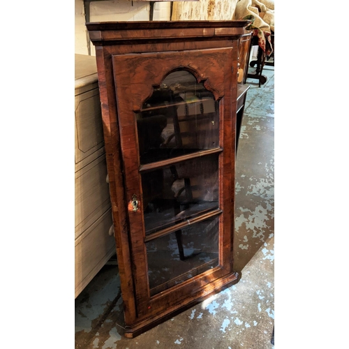 250 - HANGING CORNER CUPBOARD, George I walnut, circa 1720, with a glazed door enclosing one real and two ... 