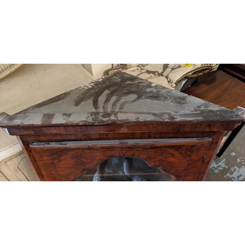 250 - HANGING CORNER CUPBOARD, George I walnut, circa 1720, with a glazed door enclosing one real and two ... 