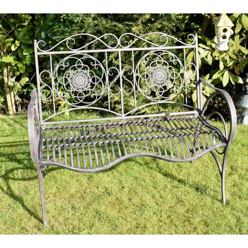 427 - ARCHITECTURAL METAL GARDEN BENCH, Italian style, 90cm H x 110cm W x 67cm D.