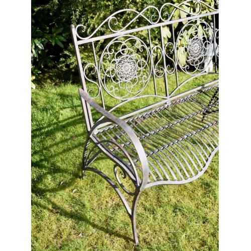 427 - ARCHITECTURAL METAL GARDEN BENCH, Italian style, 90cm H x 110cm W x 67cm D.