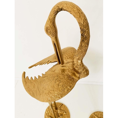 428 - SCULPTURAL CRANES, a pair, gilt metal, 26cm x 26cm x 85cm. (2)