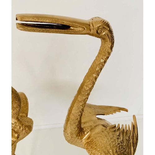 428 - SCULPTURAL CRANES, a pair, gilt metal, 26cm x 26cm x 85cm. (2)