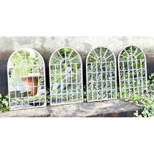 432 - ARCHITECTURAL GARDEN MIRRORS, a set of four, arched metal frames, 60cm x 36cm. (4)