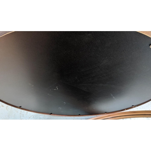 452 - CIRCULAR MIRRORS, a pair, slim bronzed metal frames, 84cm diam. (2)