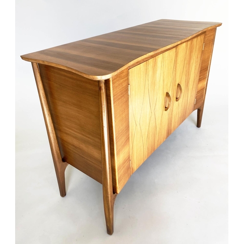 336 - SIDEBOARD, 1960s walnut, with two lozenge incised doors enclosing fitted drawers, by Everest, 129cm ... 