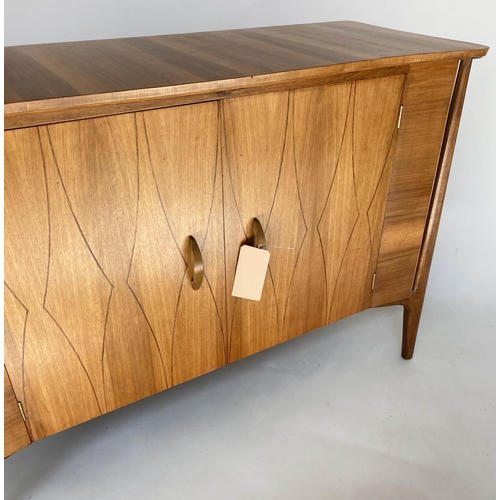 336 - SIDEBOARD, 1960s walnut, with two lozenge incised doors enclosing fitted drawers, by Everest, 129cm ... 