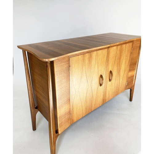 336 - SIDEBOARD, 1960s walnut, with two lozenge incised doors enclosing fitted drawers, by Everest, 129cm ... 