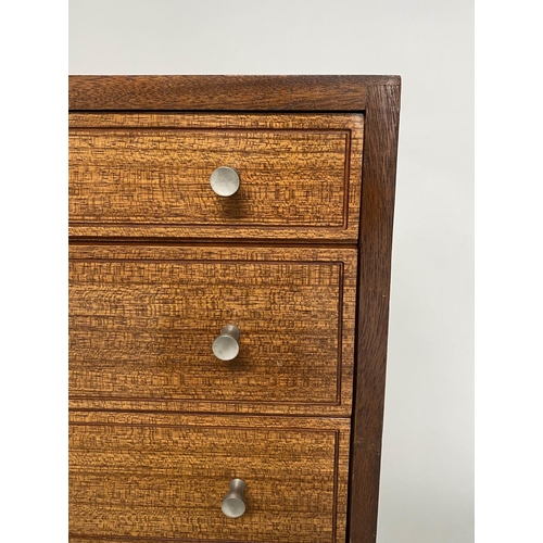 339 - SIDEBOARD, 1970s teak. with two panel doors and four drawers with indented line detail, on square su... 