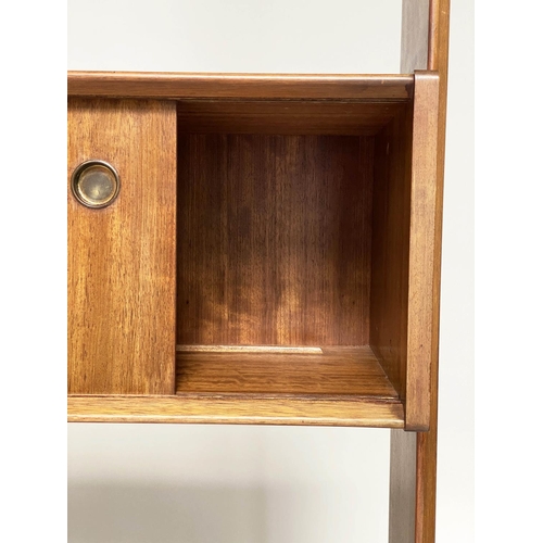 341 - G PLAN SIDE CABINET BY E GOMME, sapele and ebonised, with drawers and doors raised on swept supports... 