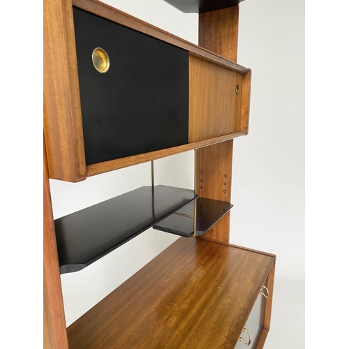 341 - G PLAN SIDE CABINET BY E GOMME, sapele and ebonised, with drawers and doors raised on swept supports... 